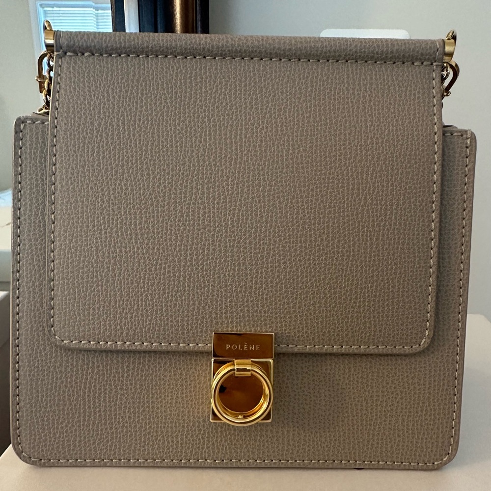 Brand new. Never used Numero Sept mini textured taupe